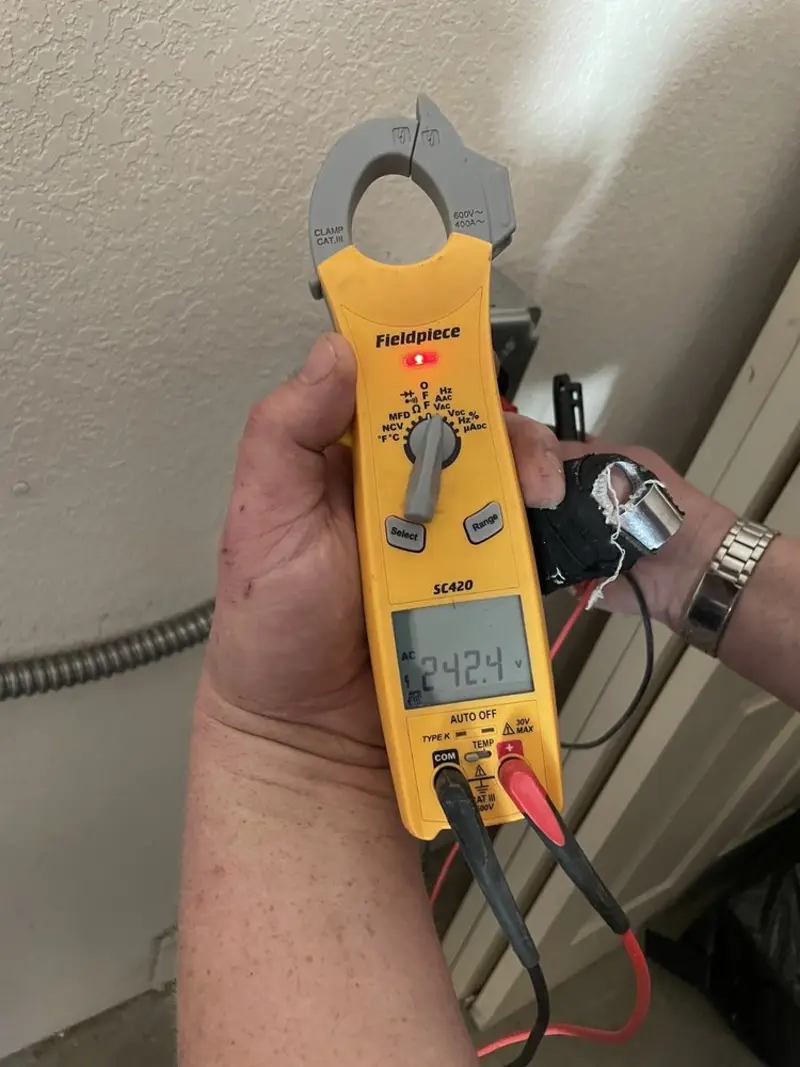 Voltage testing with clamp meter during Aluminum Wiring Replacement in Freeport